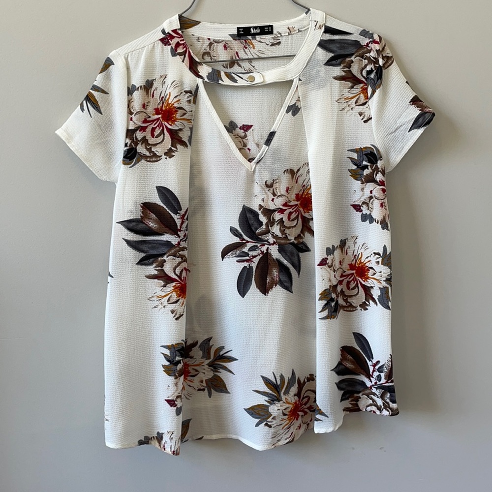 white floral blouse